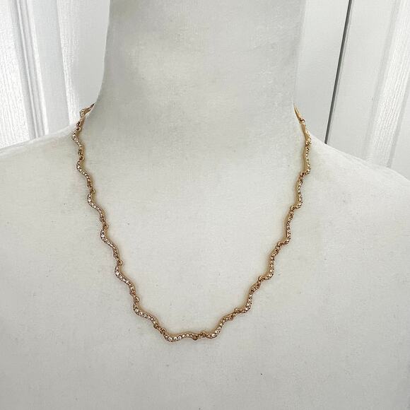 Signed Swarovski Crystal Elegant Gold Tone Wave Necklace missing one small stone - Picture 3 of 7